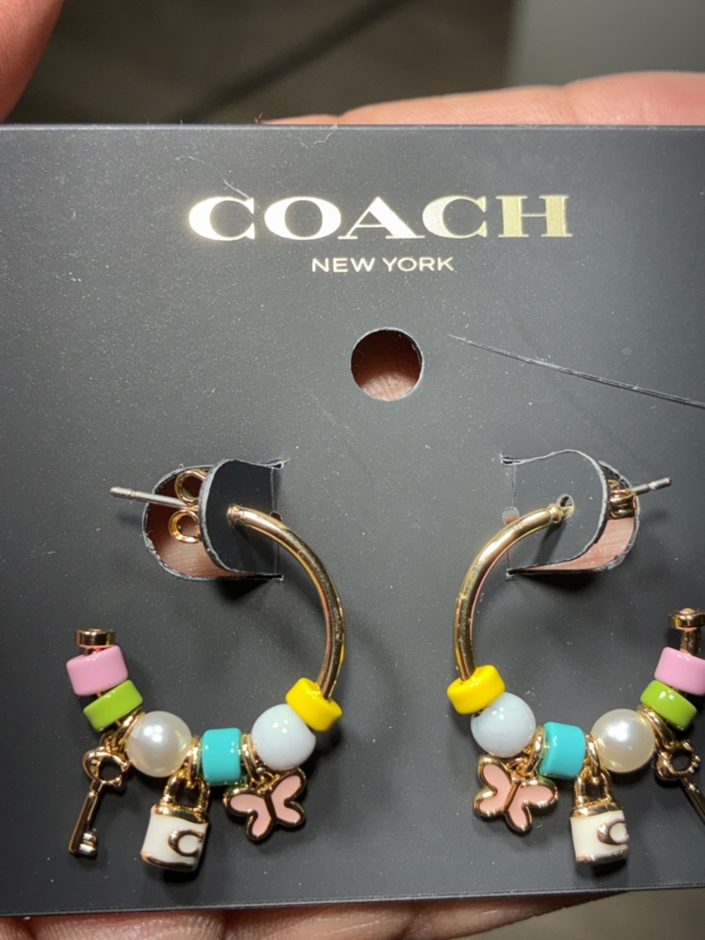 Coach Beaded charm dangling hoop earrings